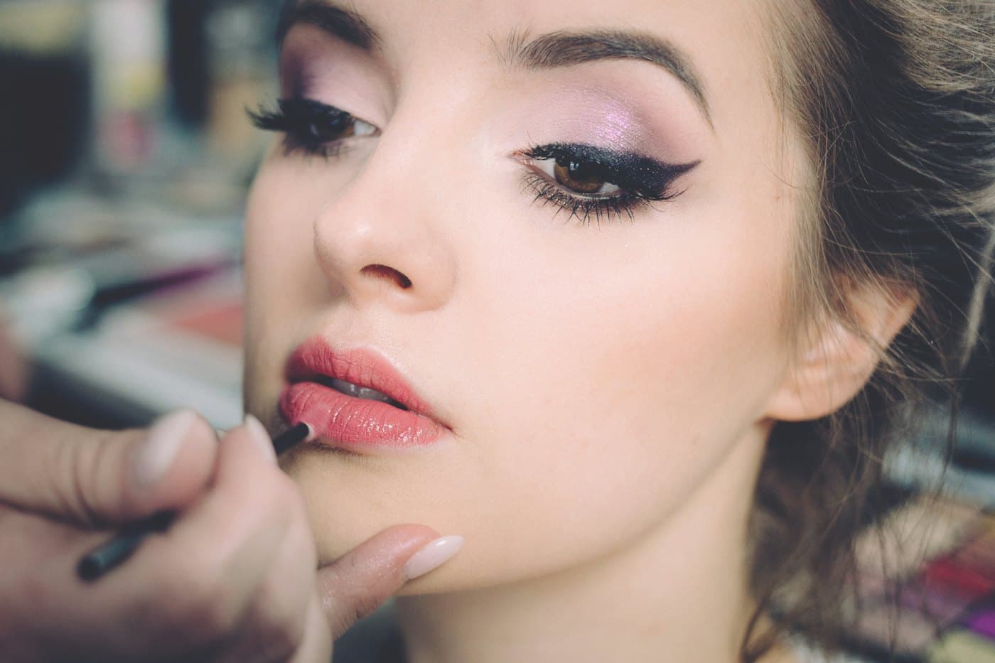 Eye makeup being applied