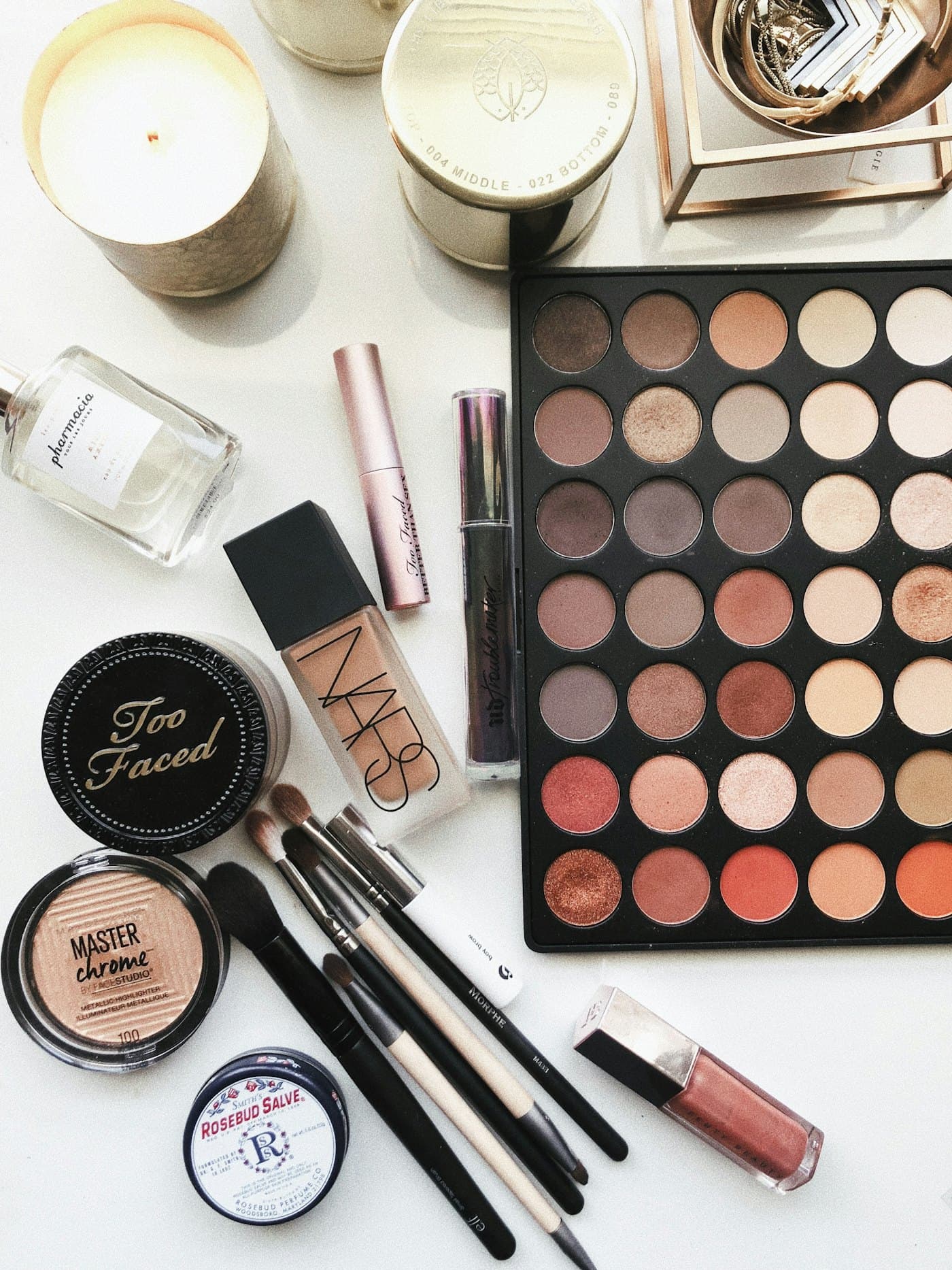 An eyeshadow palette and brushes