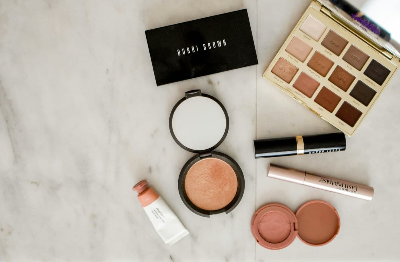 Makeup products on marble