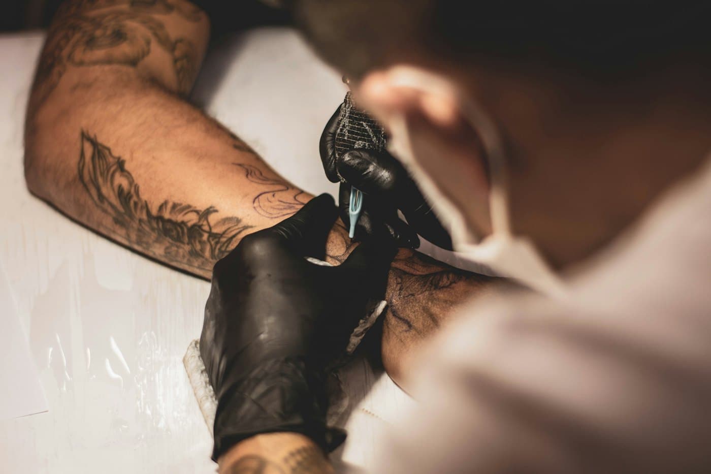 A tattoo artist at work