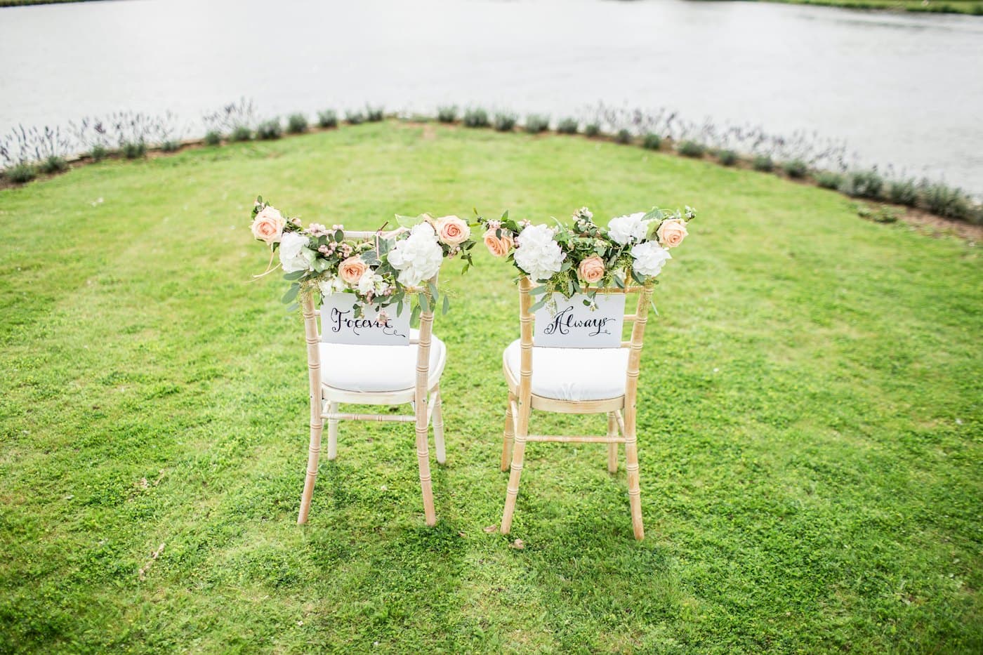 Two chairs for the couple on a lawn